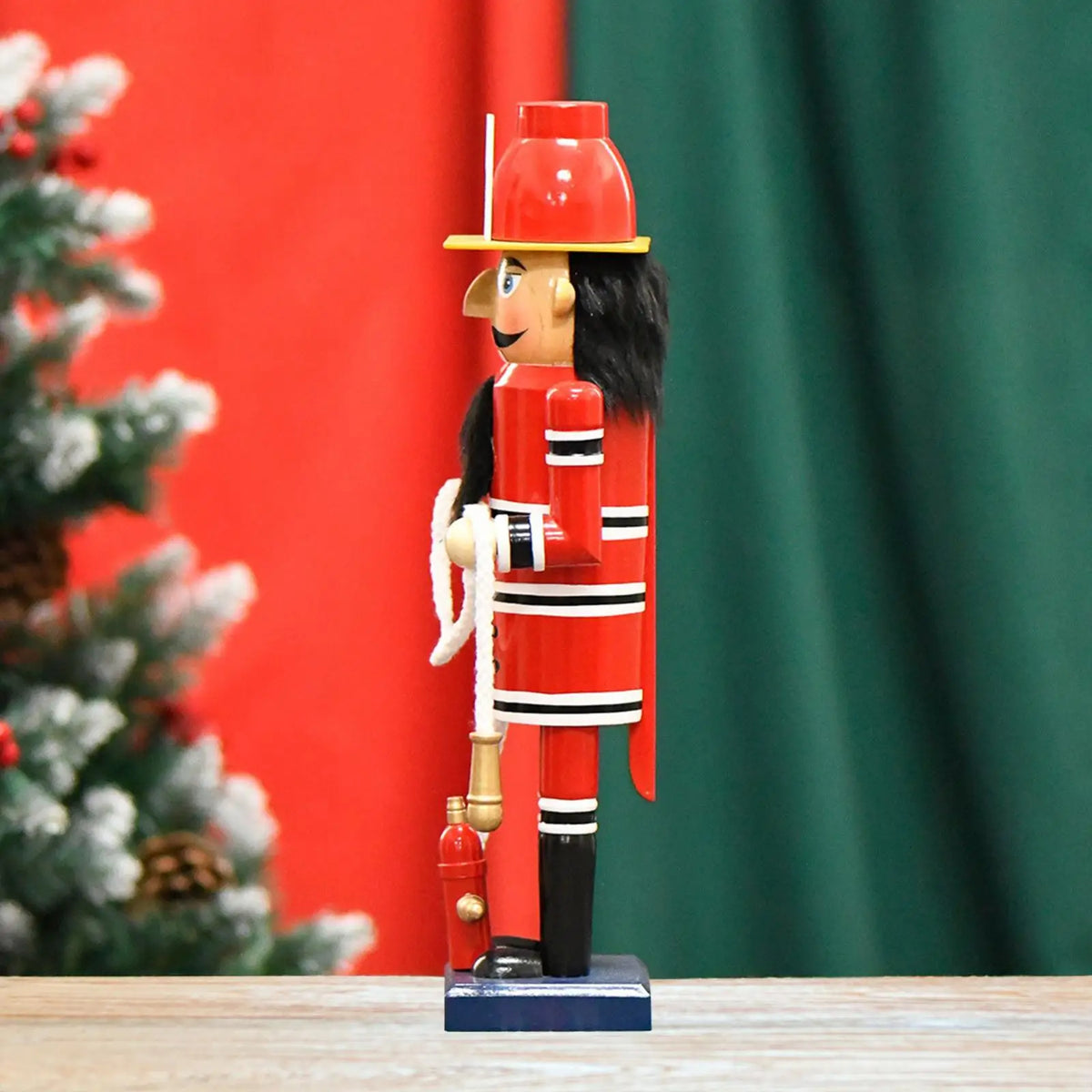 Side view of firefighter nutcracker wooden soldier